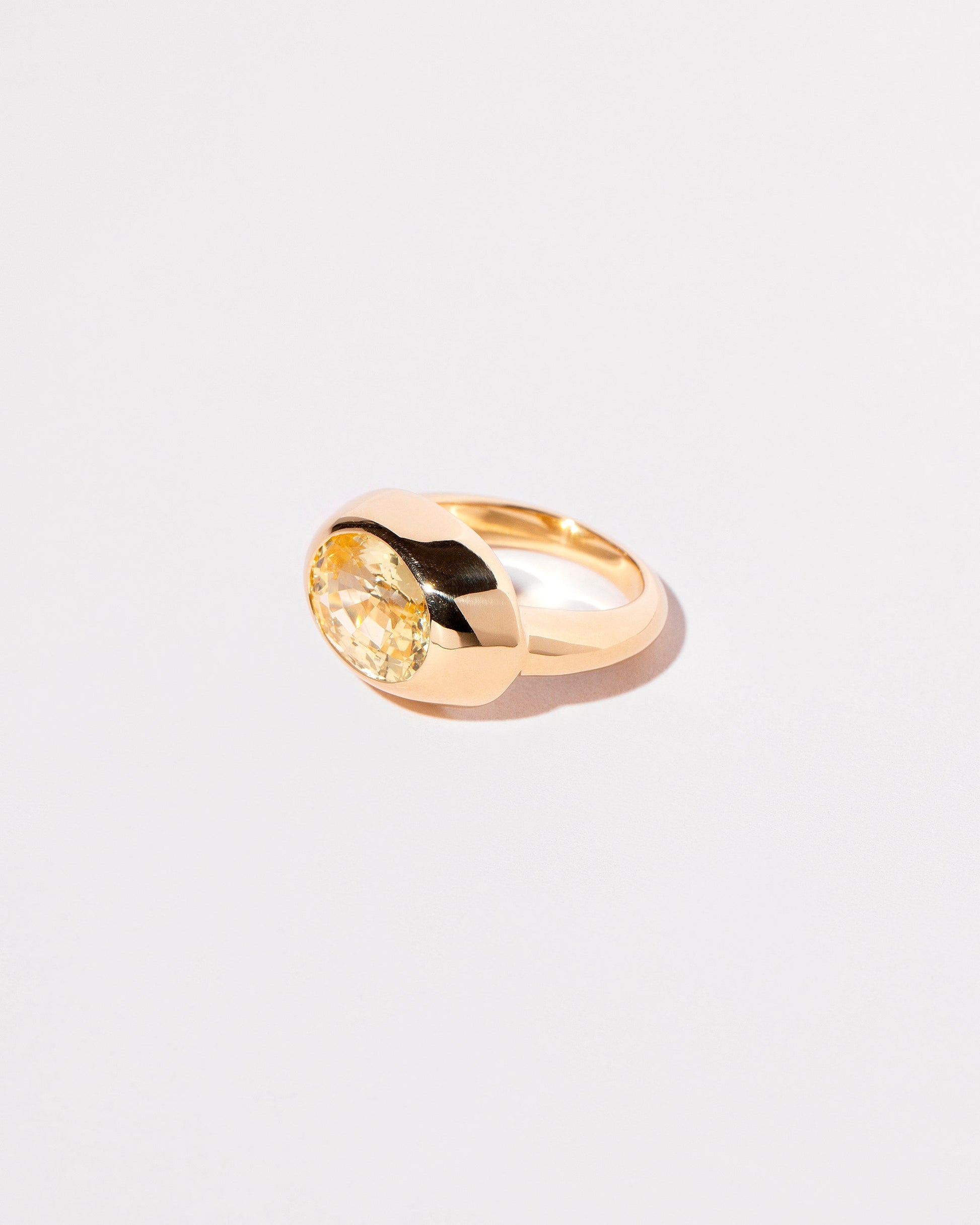 View from the side of the Antlia Ring on light color background.