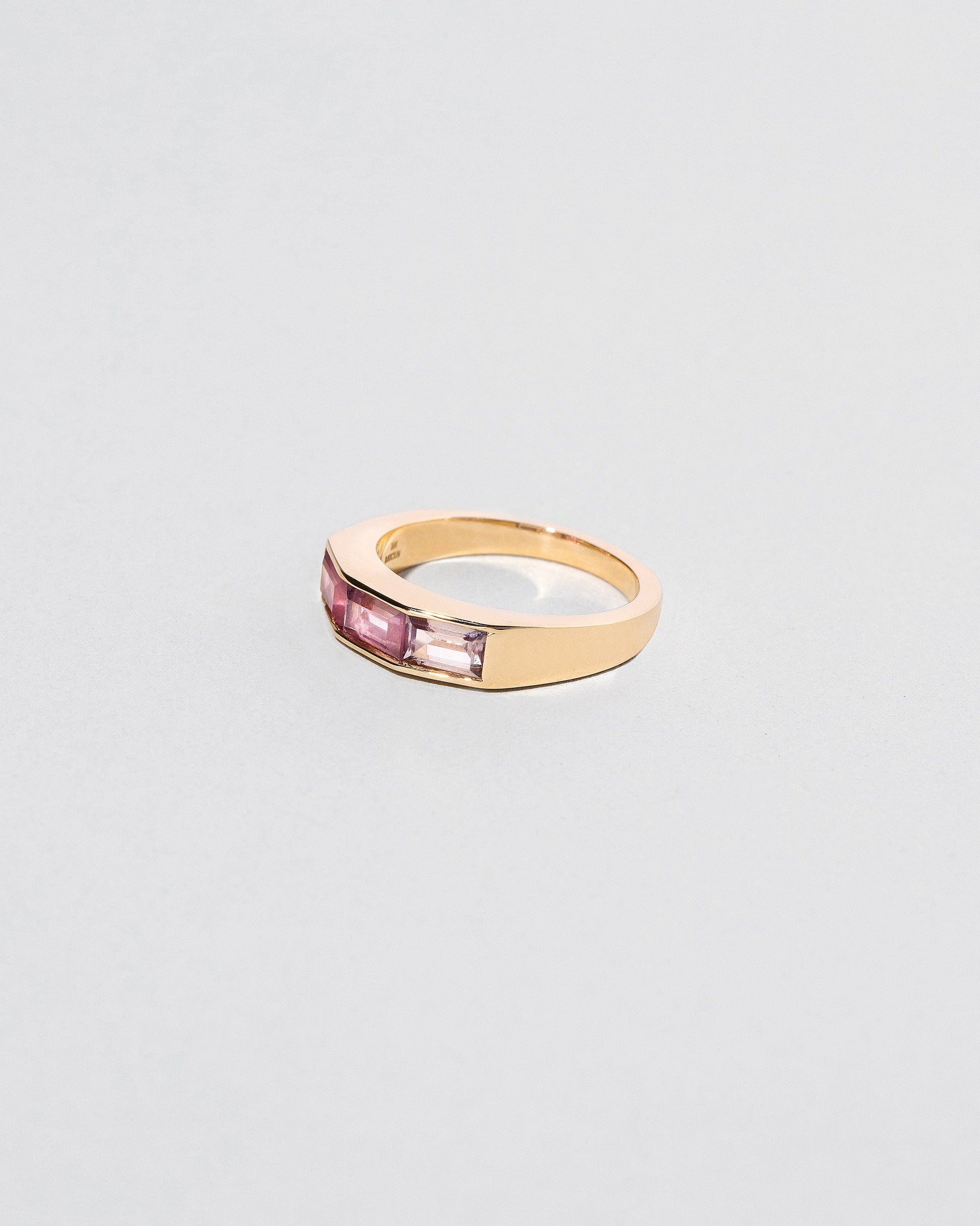 Amba Ring on light color background.