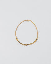  Inclusion Bracelet on light color background.