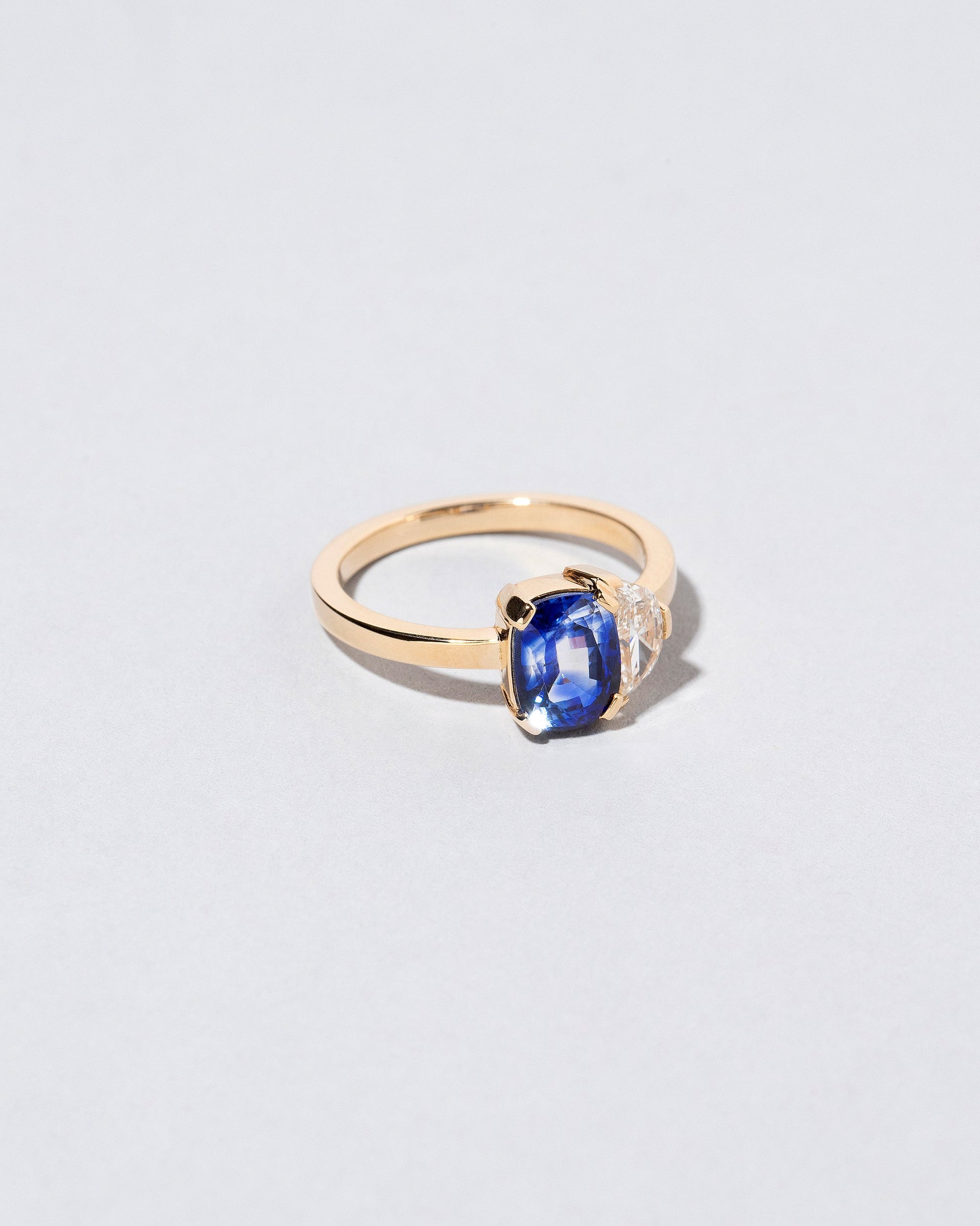  Dualism Ring on light color background.