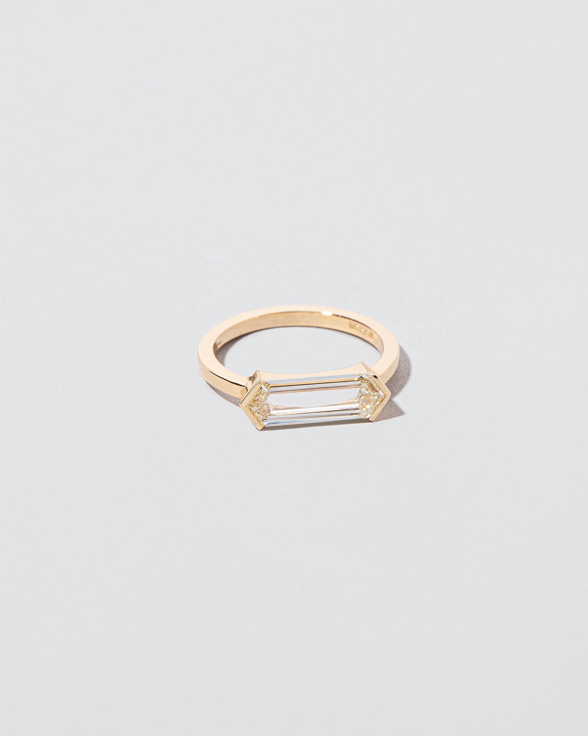 View from the side of the Titan Ring on light color background.