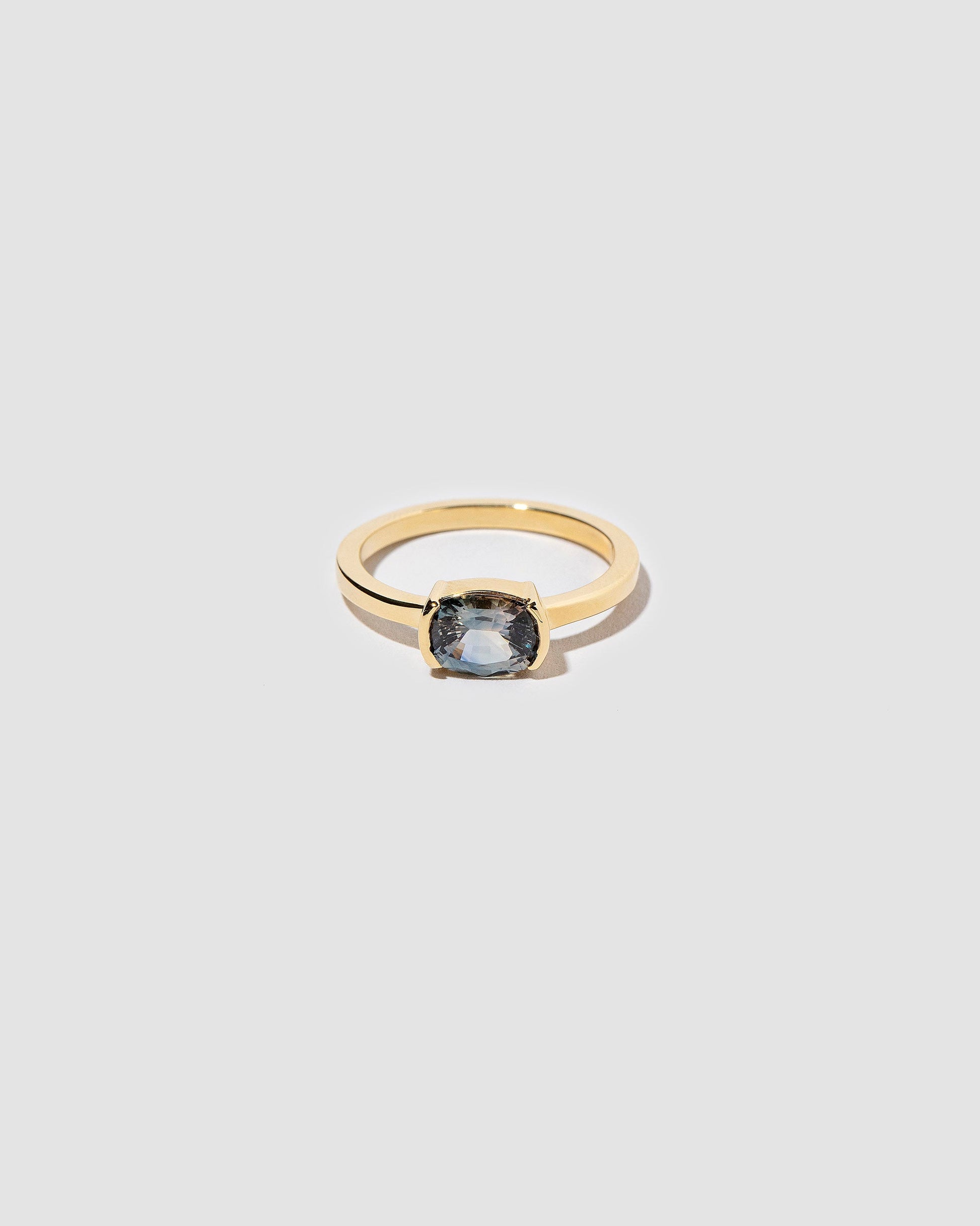 Heartline Ring on light color background.