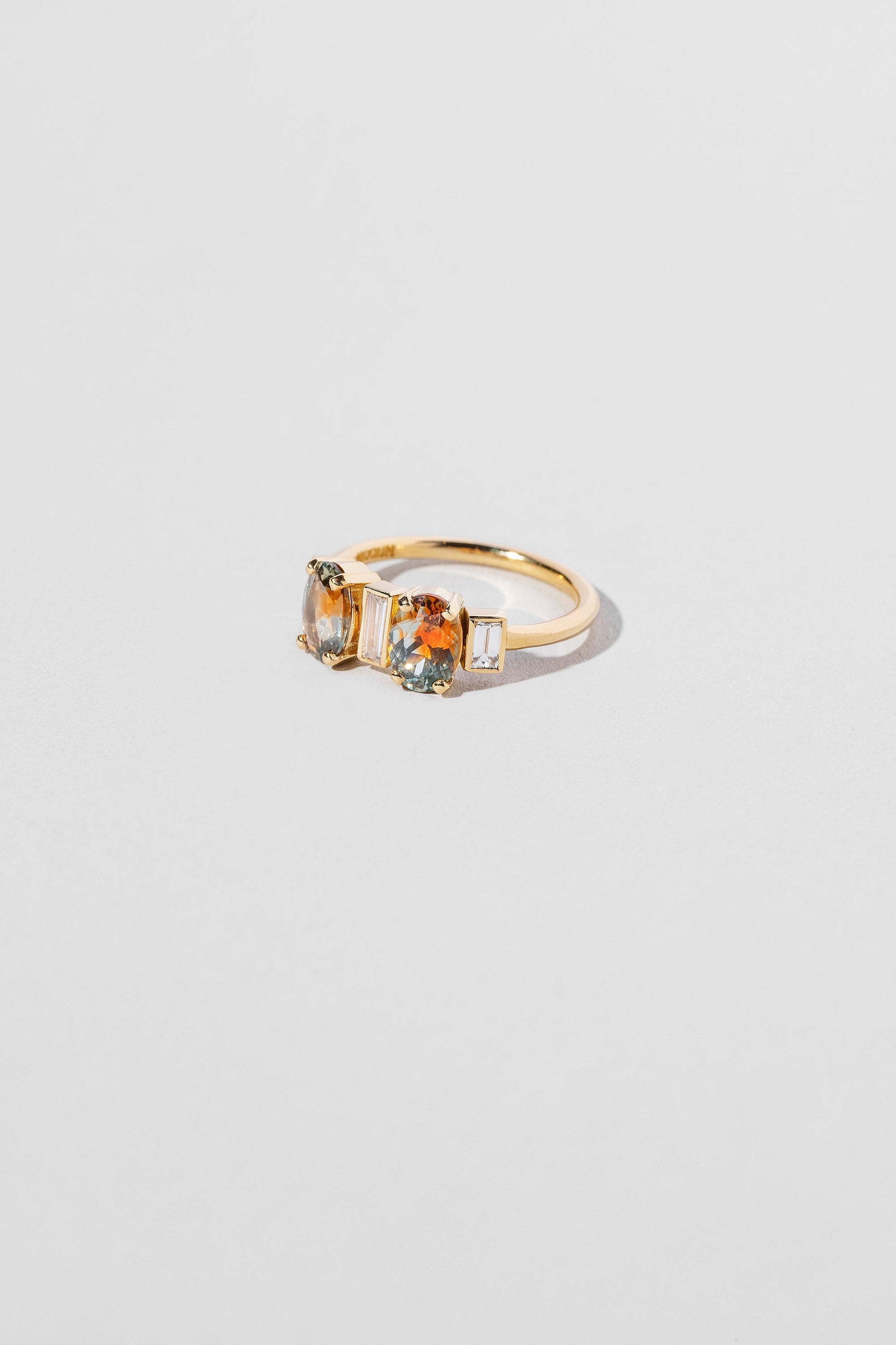  Castor & Pollux Ring on light color background.