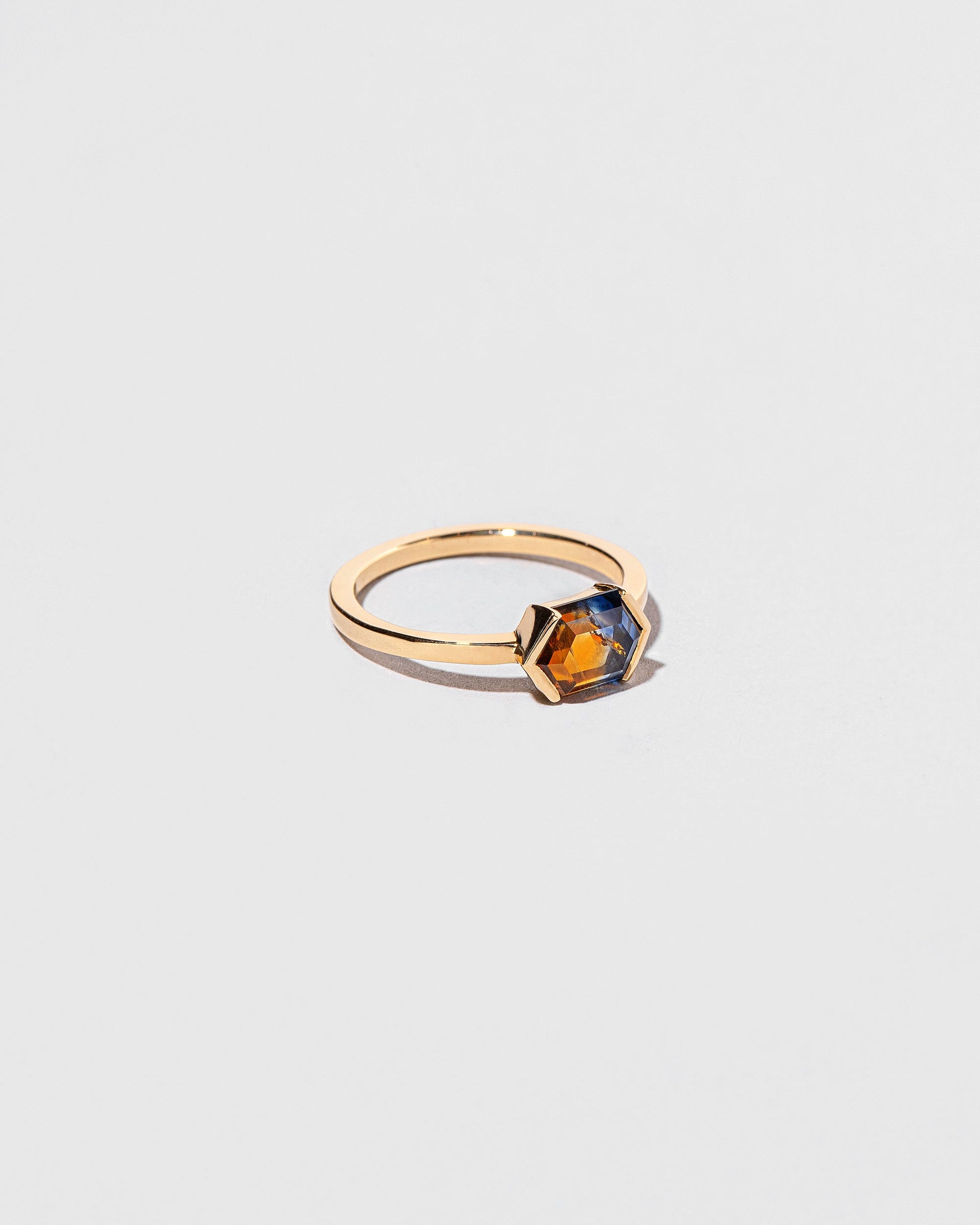 View from the side of the Elanor Ring on light color background.
