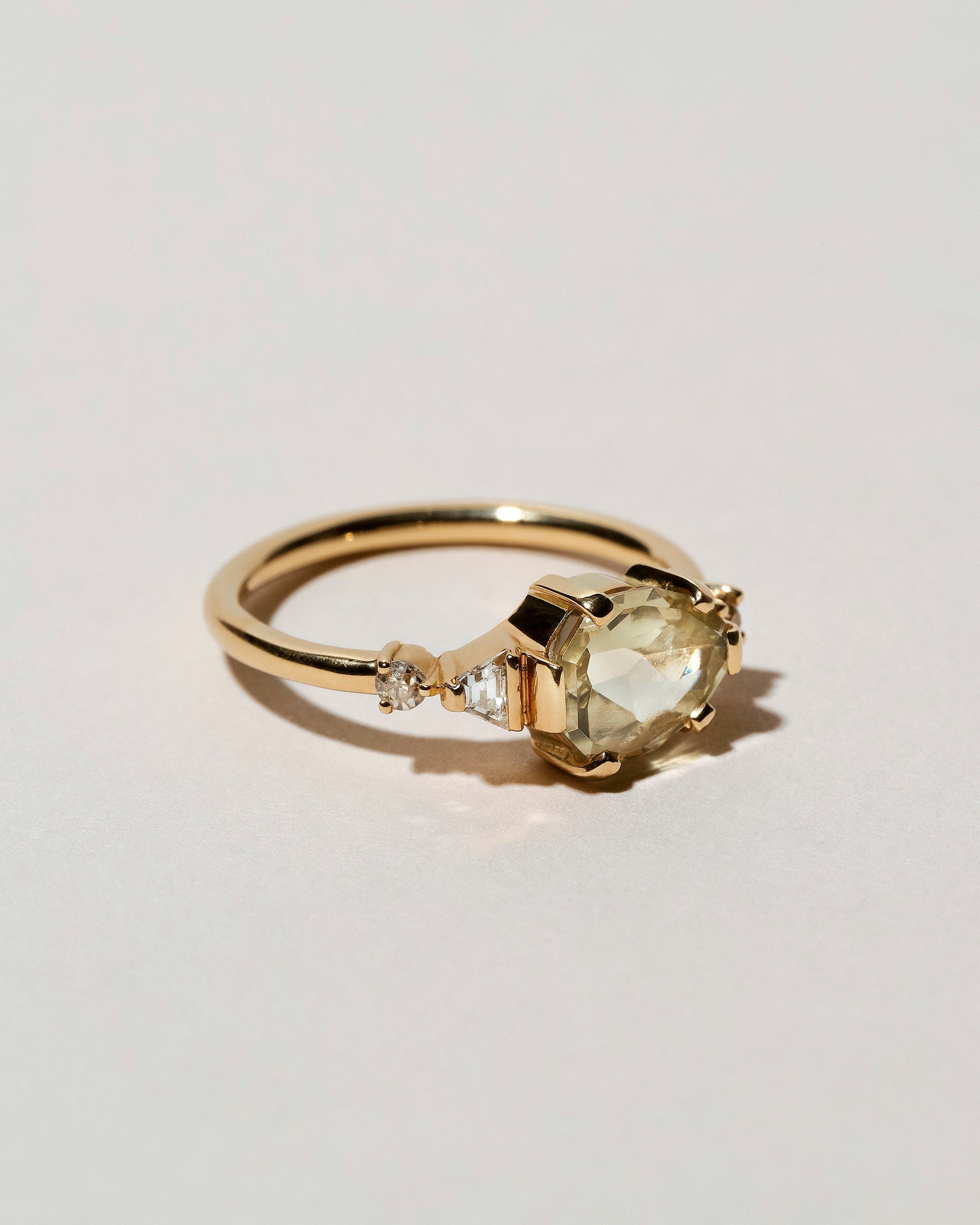  Light Green Grossular Garnet Cluster Ring on light color background.