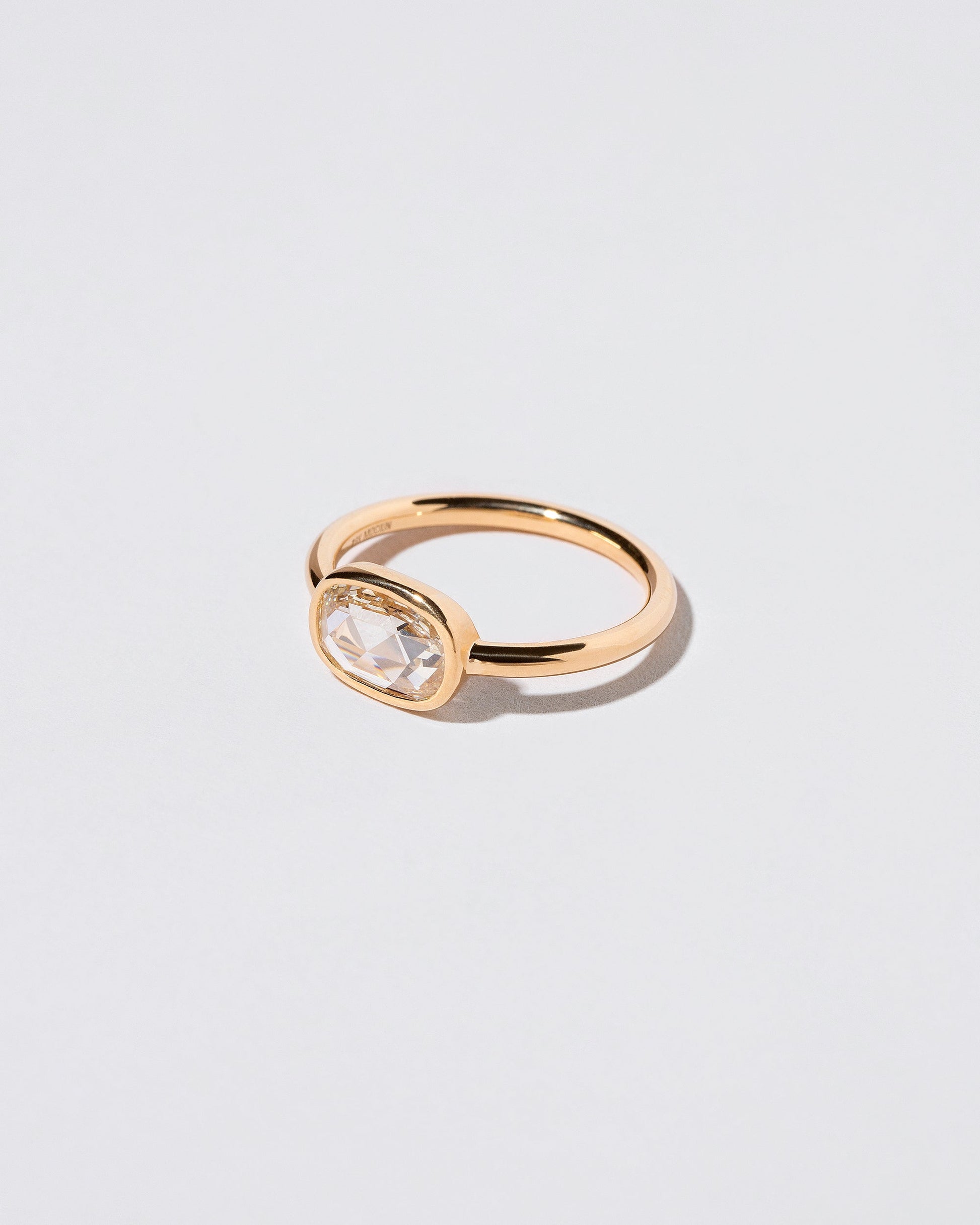 View from the side of the Apollo Ring on light color background.