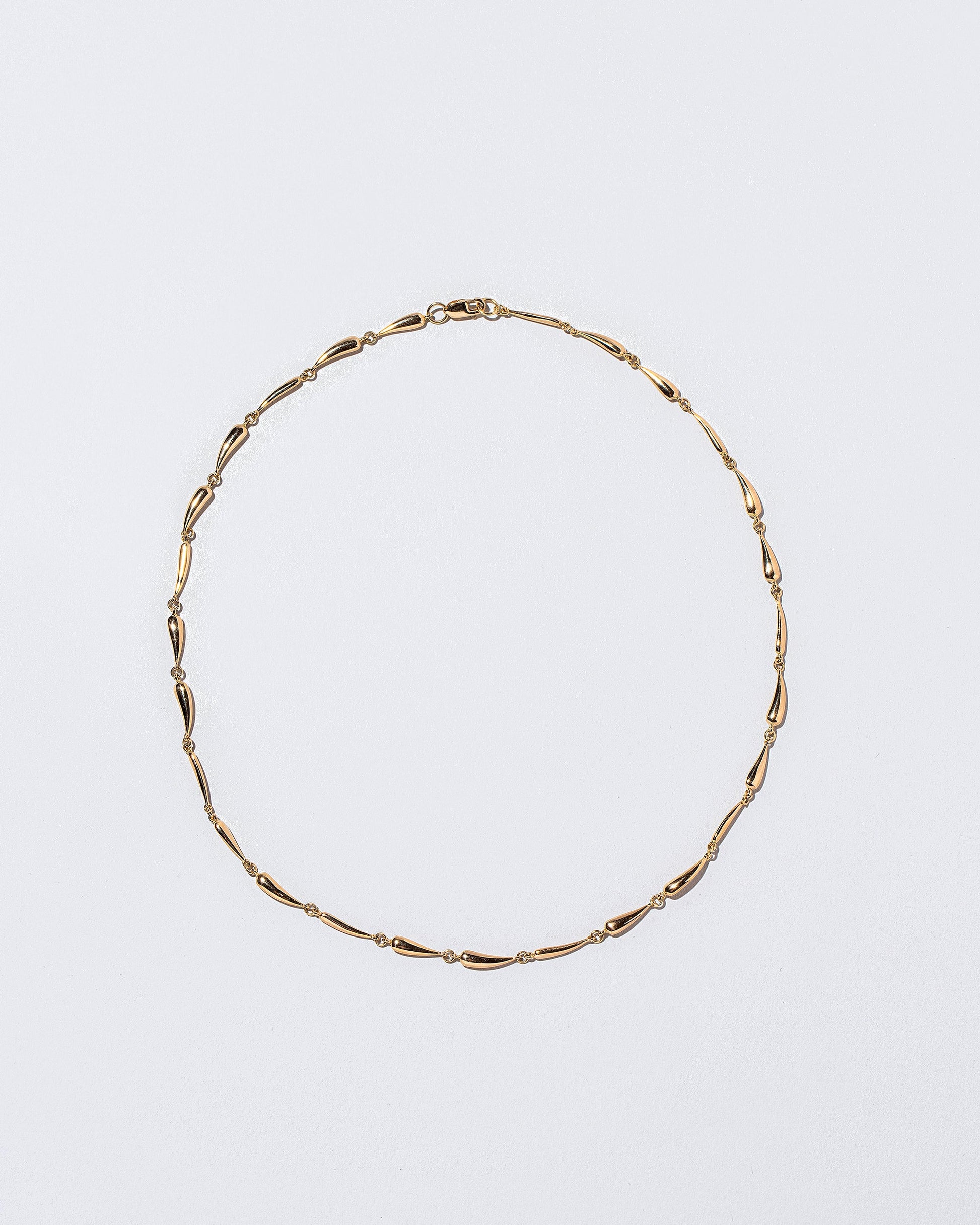 Accumulation Necklace on light color background.