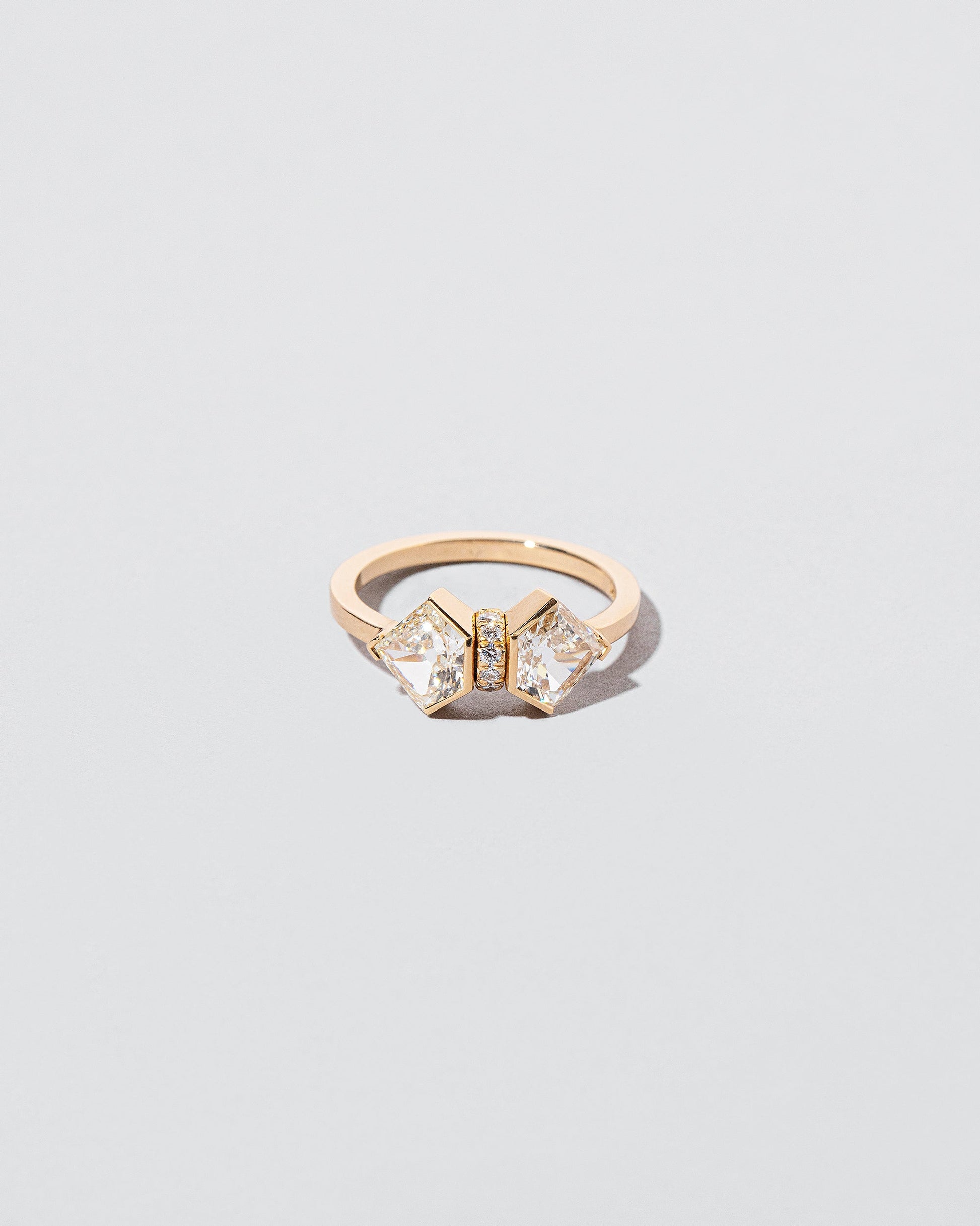 Alchemy Ring on light color background.