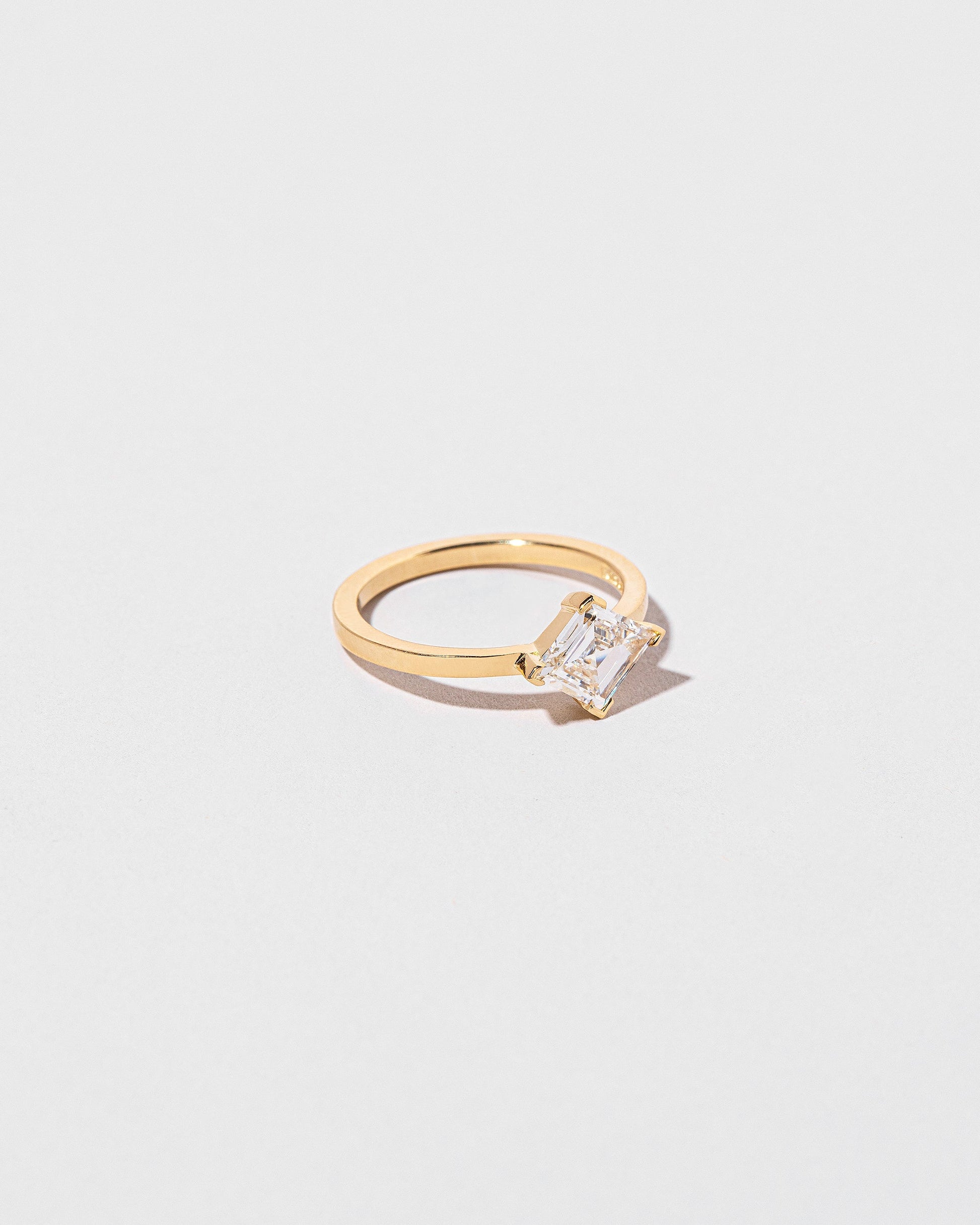 View from the side of the Paradox Ring on light color background.