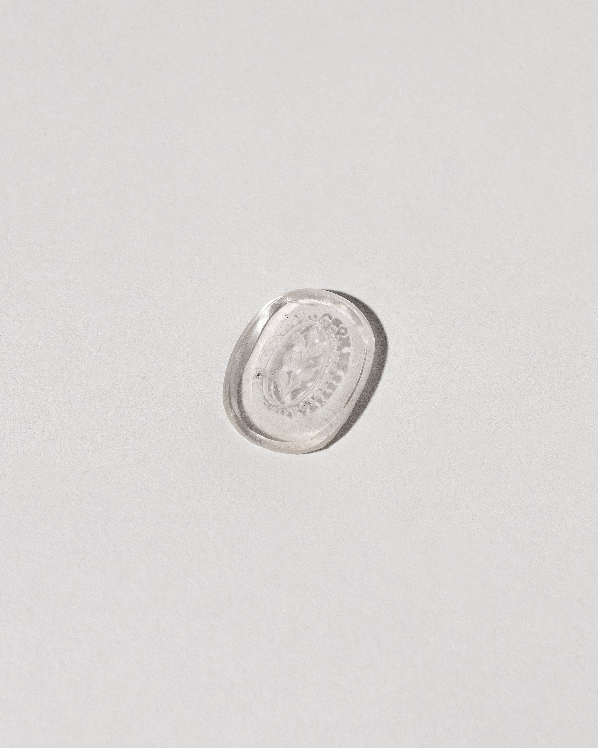 Strength Intaglio Seal on light color background.