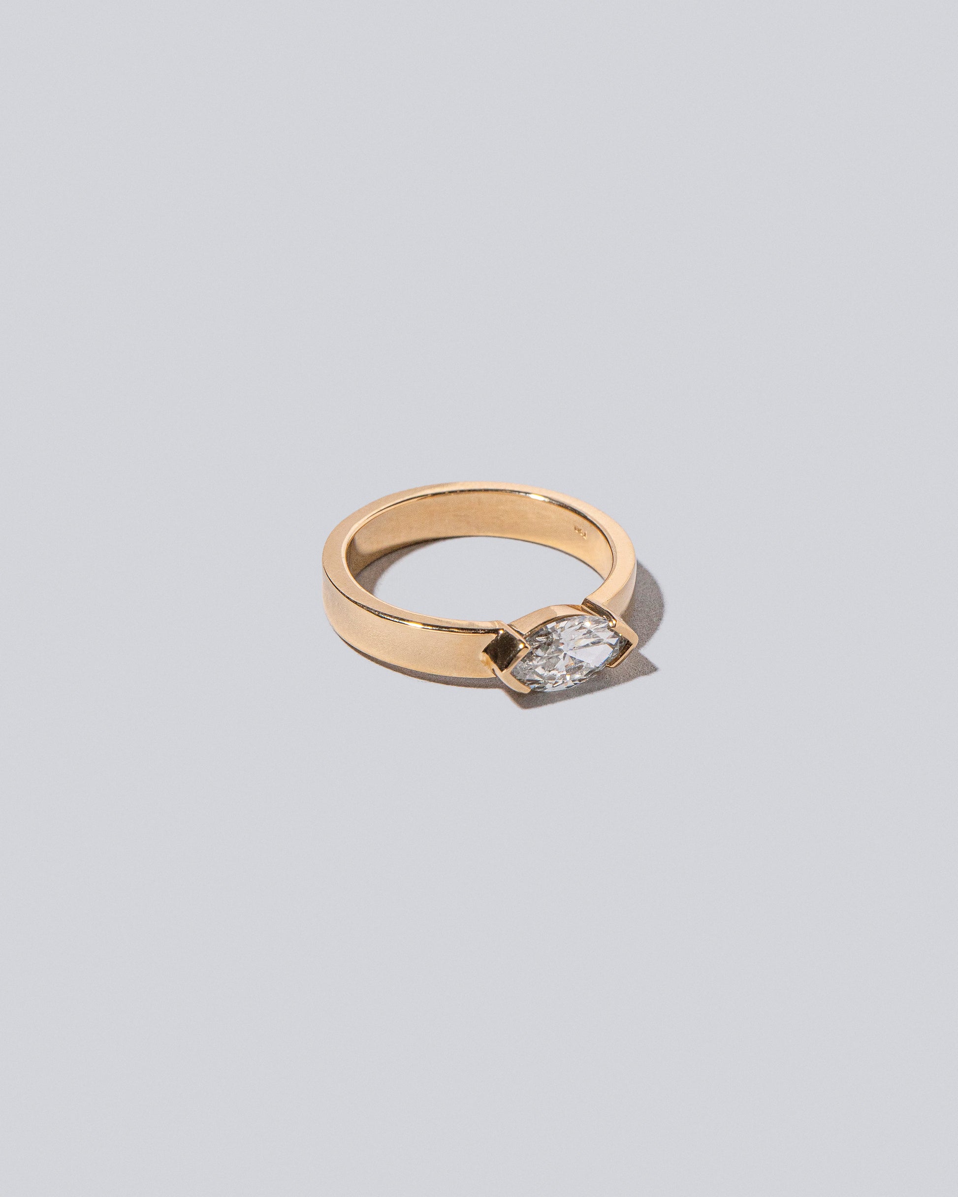 View from the side of the Pocket Ring on light color background.
