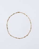  Accumulation Necklace on light color background.