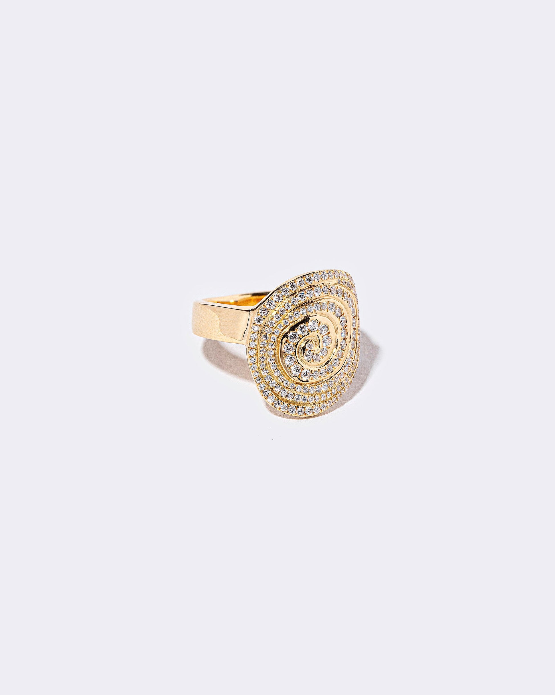 Closeup details of the White Diamond Lifecycle Ring on light color background.