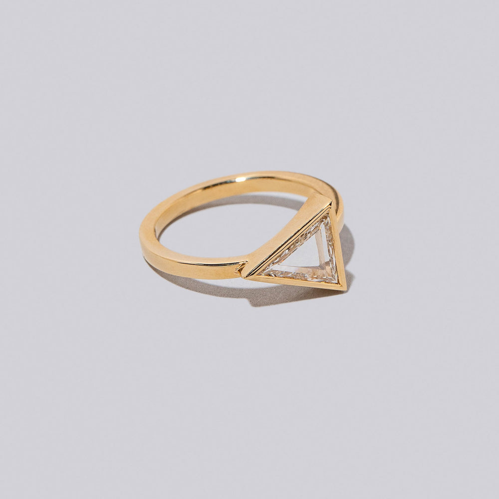 product_details::Closeup details of the Cymbal Ring on light color background.