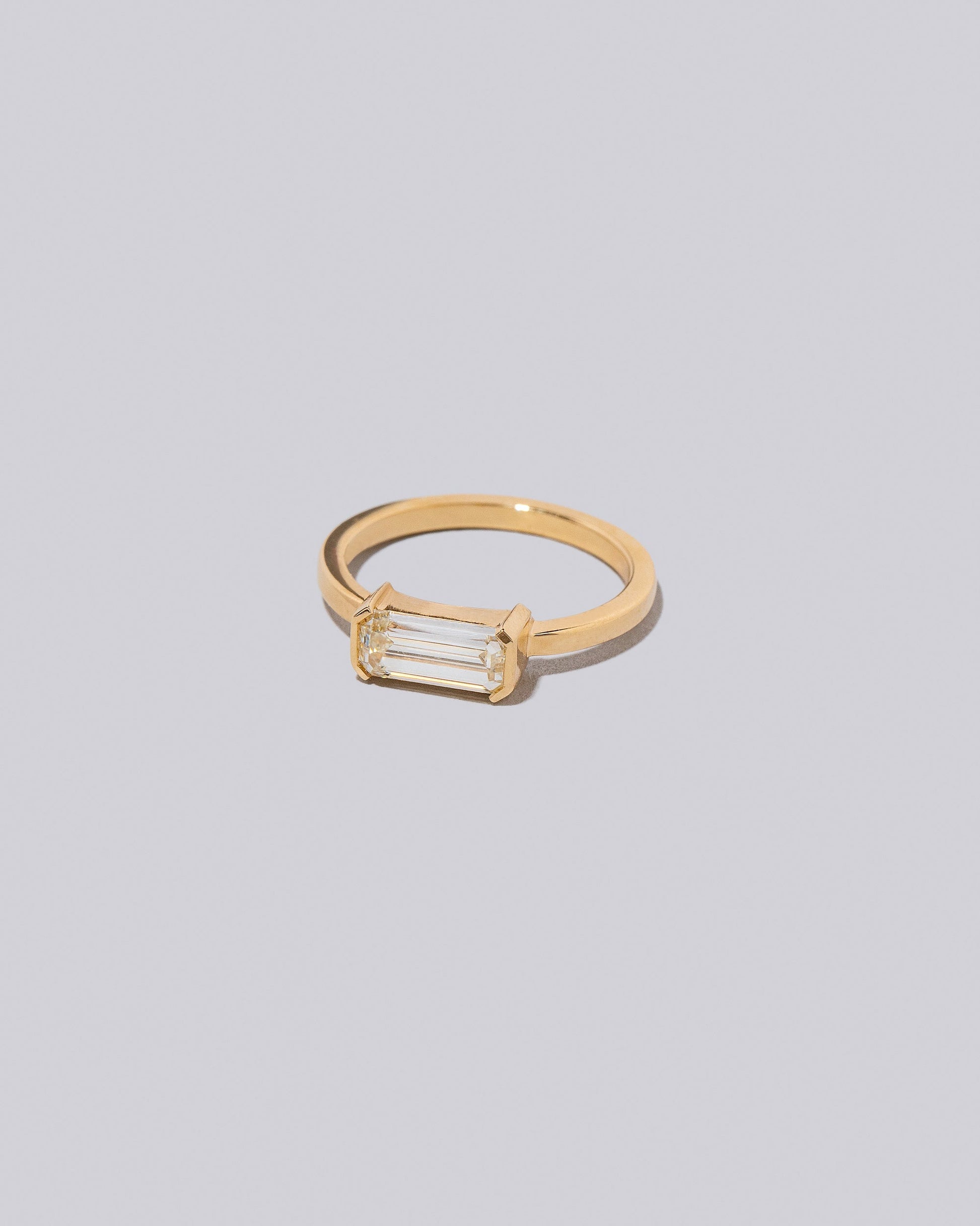 View from the side of the Vibrato Ring on light color background.