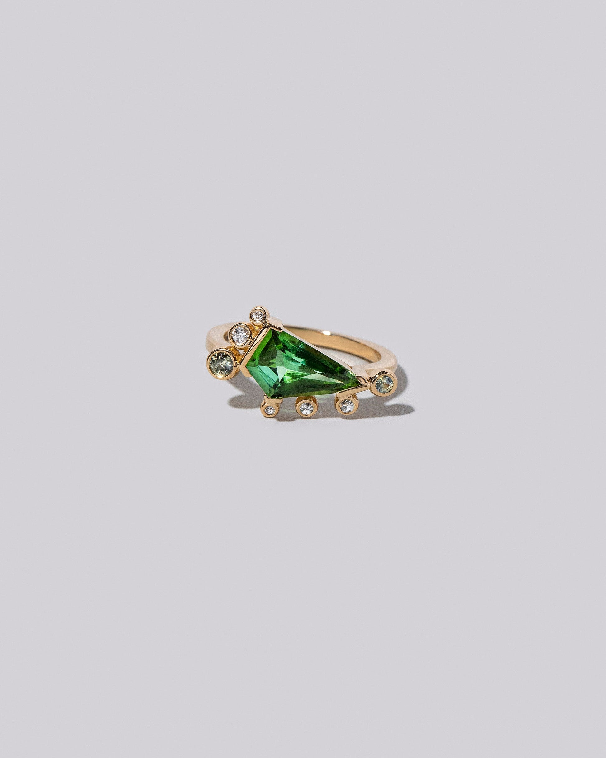  Faith Healer Ring on light color background.