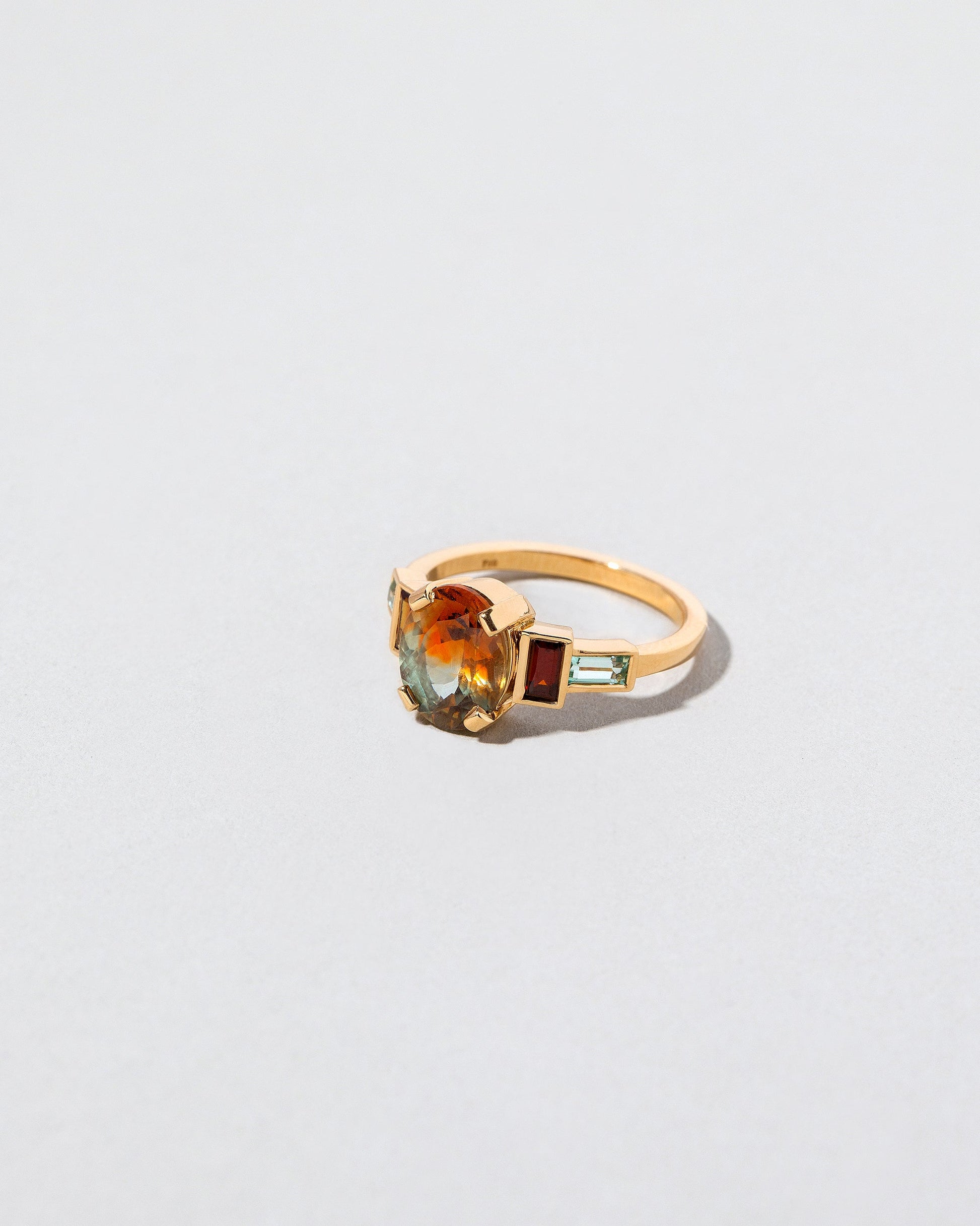  Acton Ring on light color background.