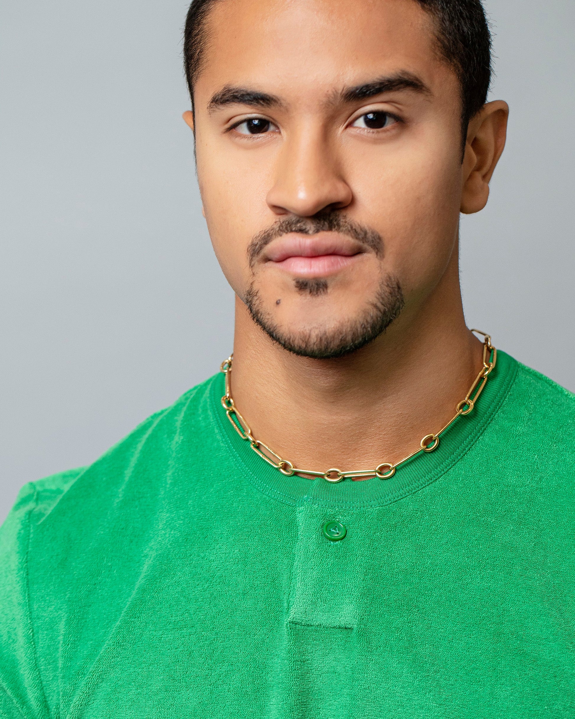 Solid Mixed Karat Link Necklace on male model.