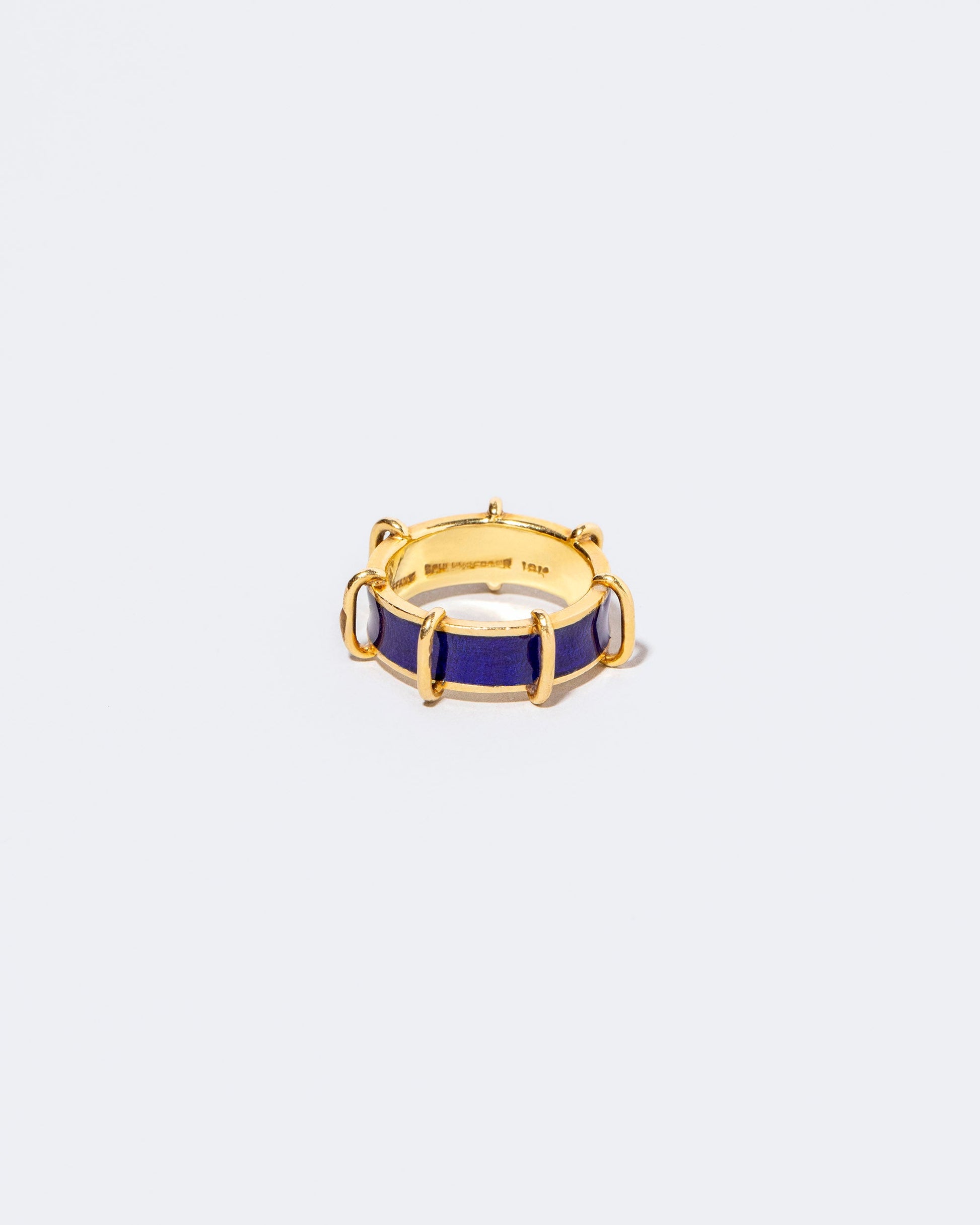 Tiffany & Co. Enamel Band on light color background.