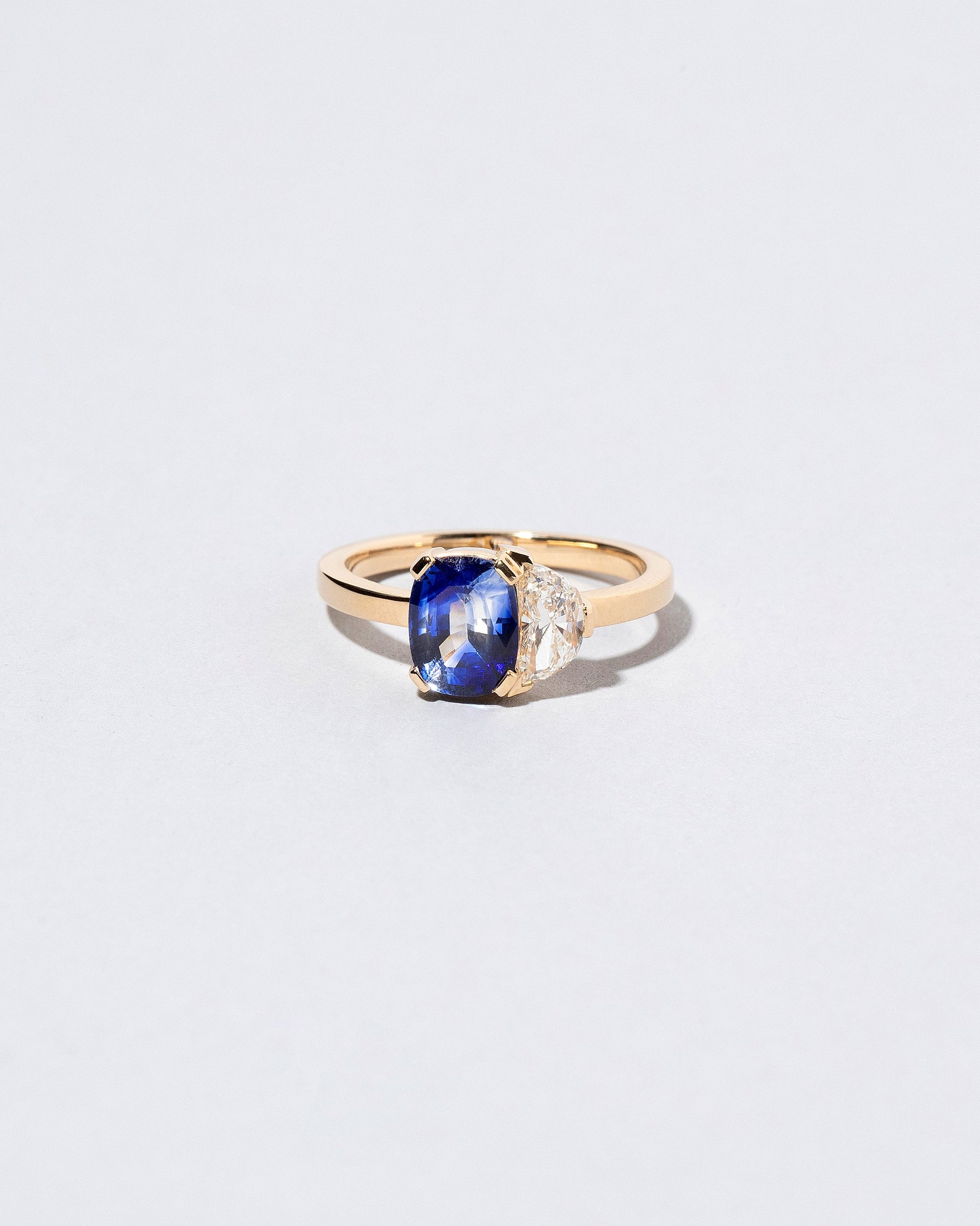  Dualism Ring on light color background.
