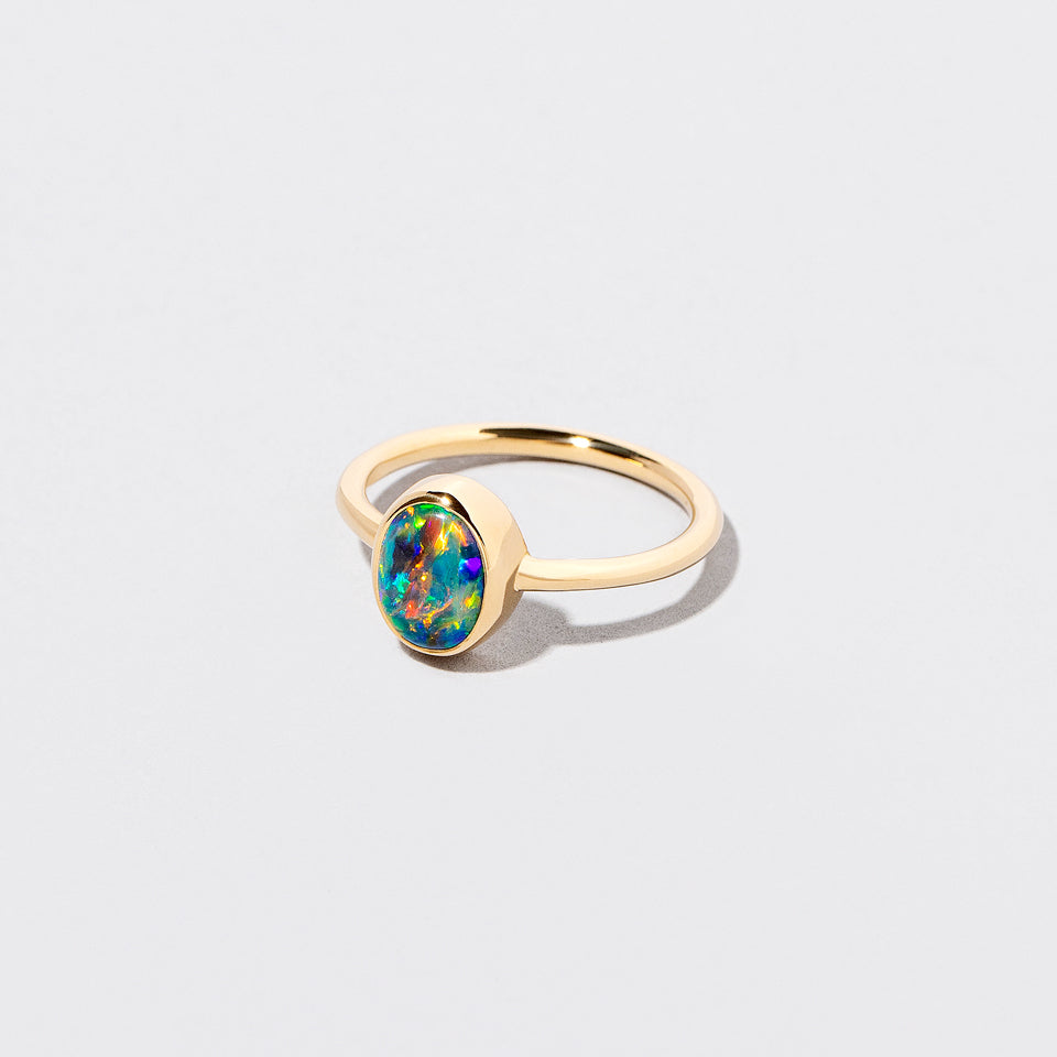 product_details::Closeup details of the Elder Ring on light color background.