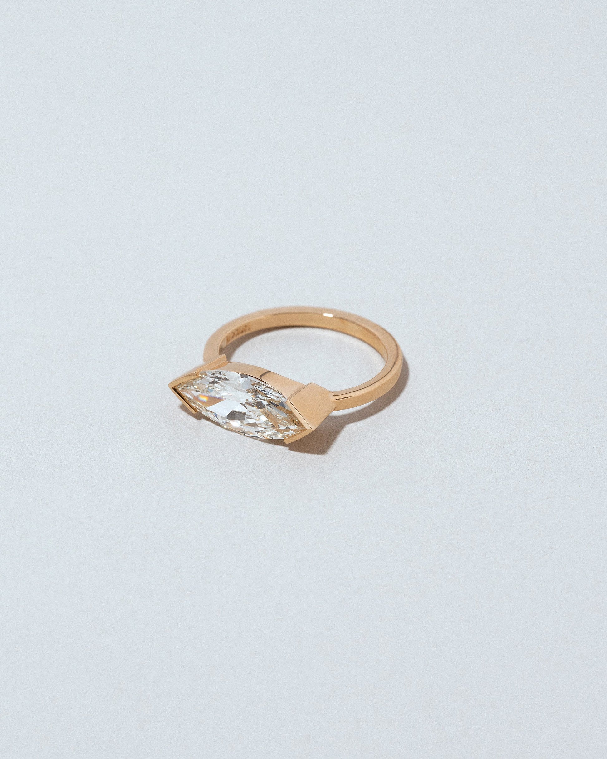 View from the side of the Daylight Ring on light color background.