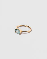 View from the side of the Athelas Ring on light color background.