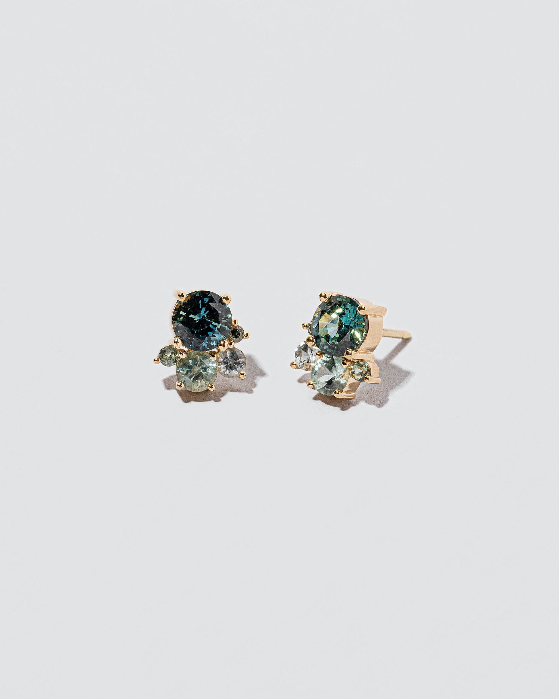  Aerial Earrings on light color background.