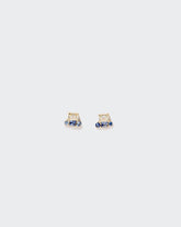 Linear Stud Earrings on light color background.