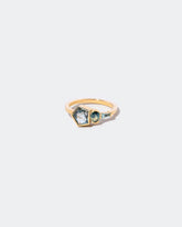  Syncretism Ring on light color background.