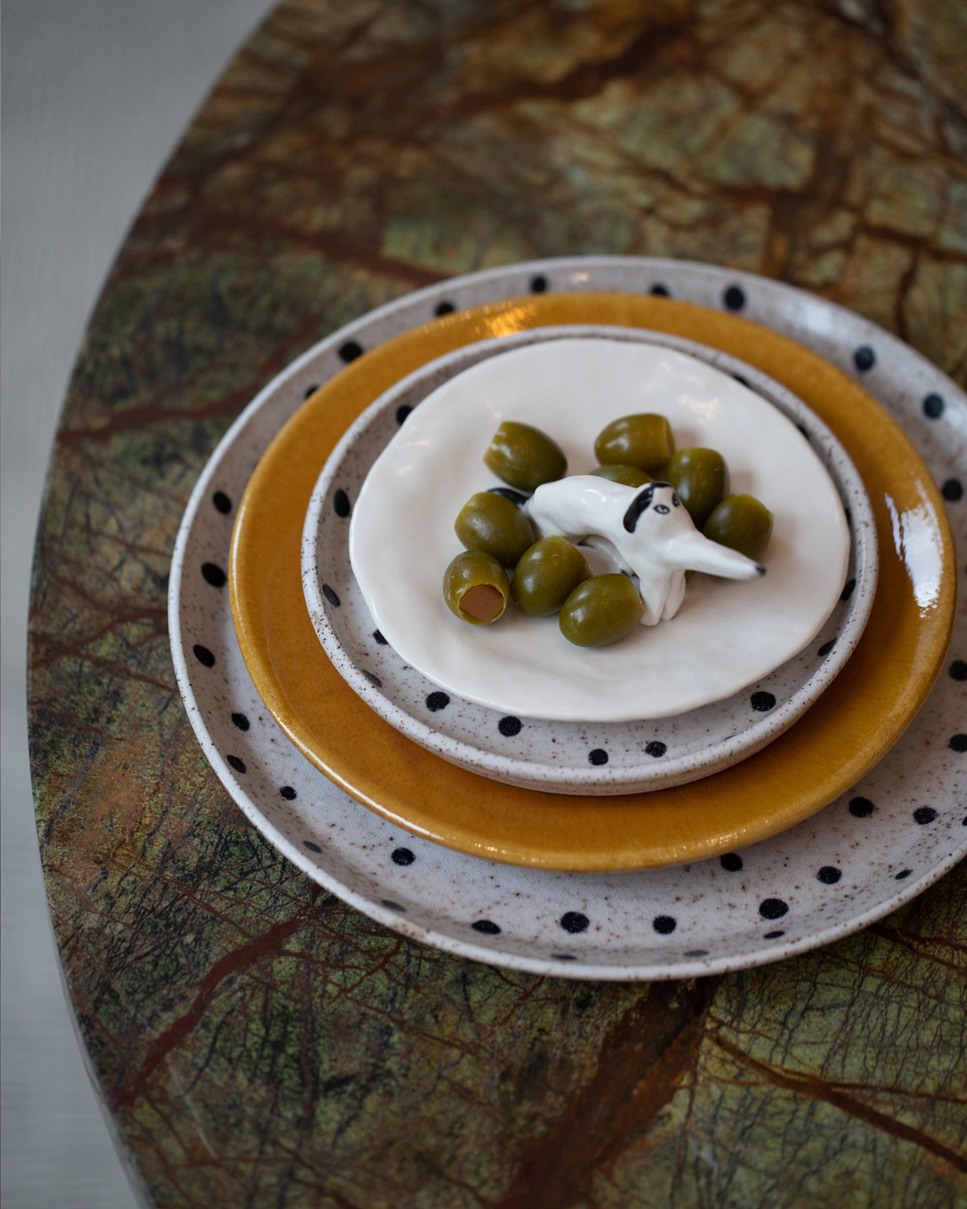 Styled image featuring the Eleonor Boström Dog Ring Dish.