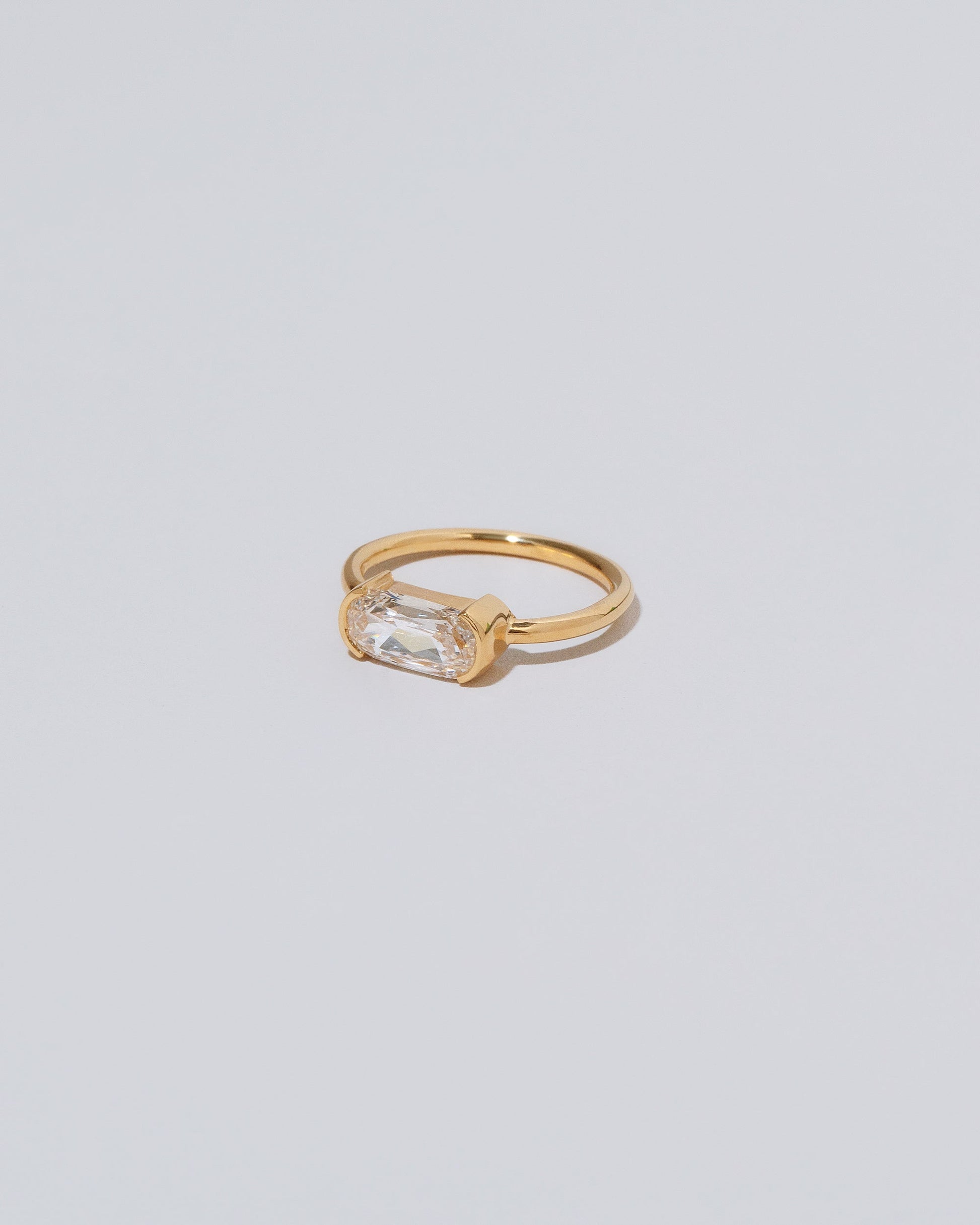 View from the side of the Passé Ring on light color background.
