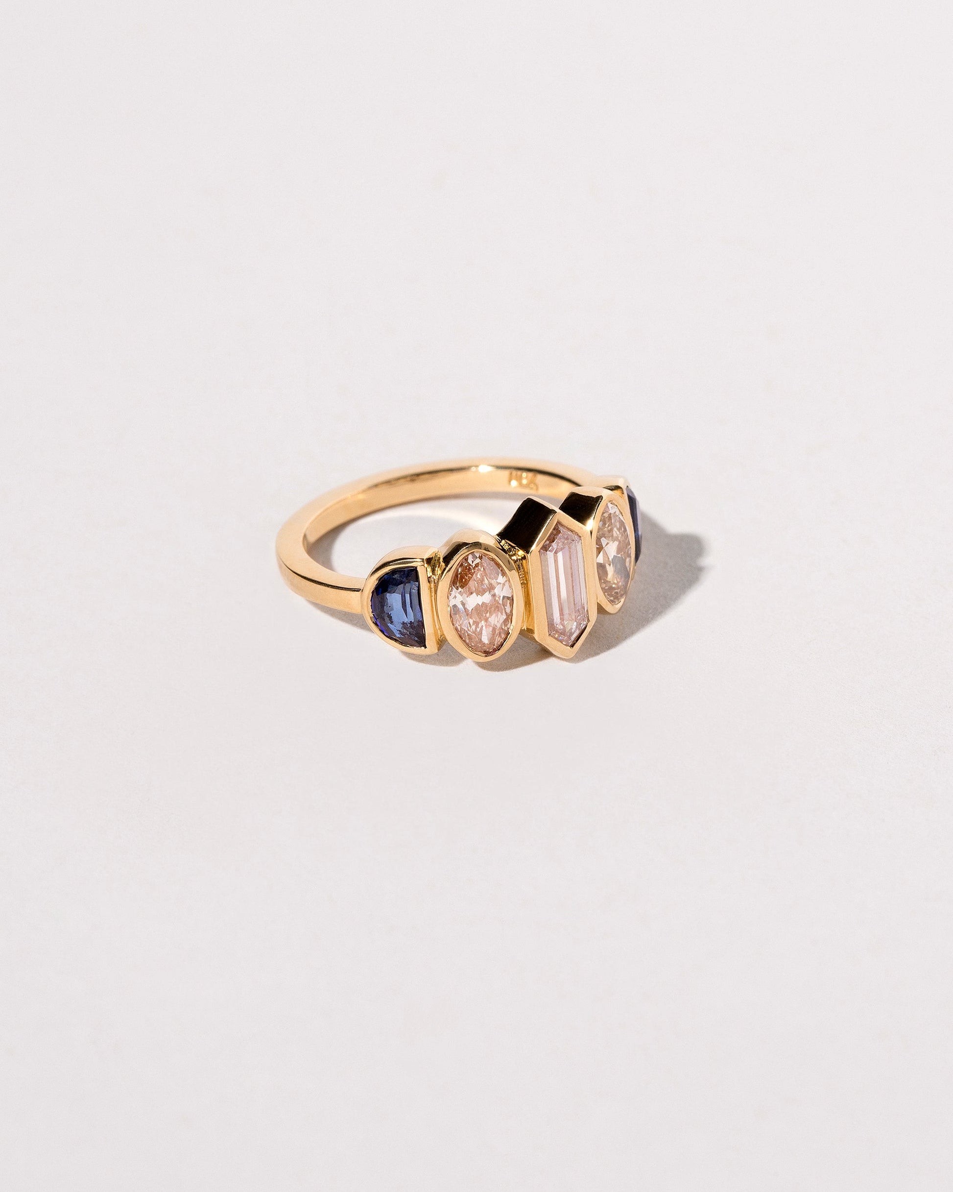  Larkspur Ring on light color background.
